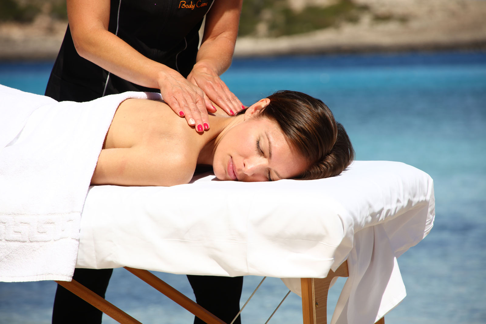 Full body massage on the beach